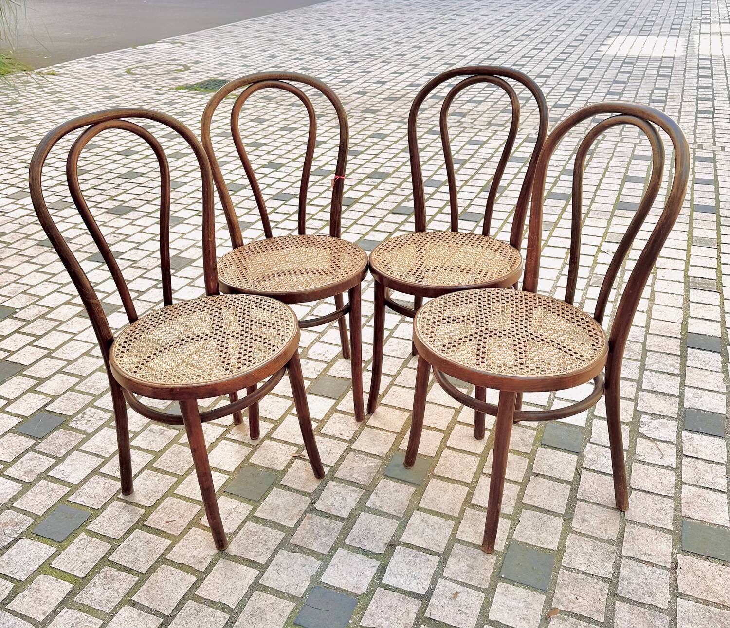 Wooden and cane bistro chairs
