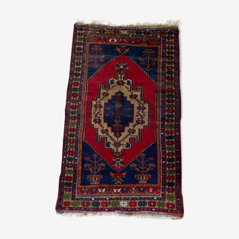 Ancient Berber wool carpet 117x198cm