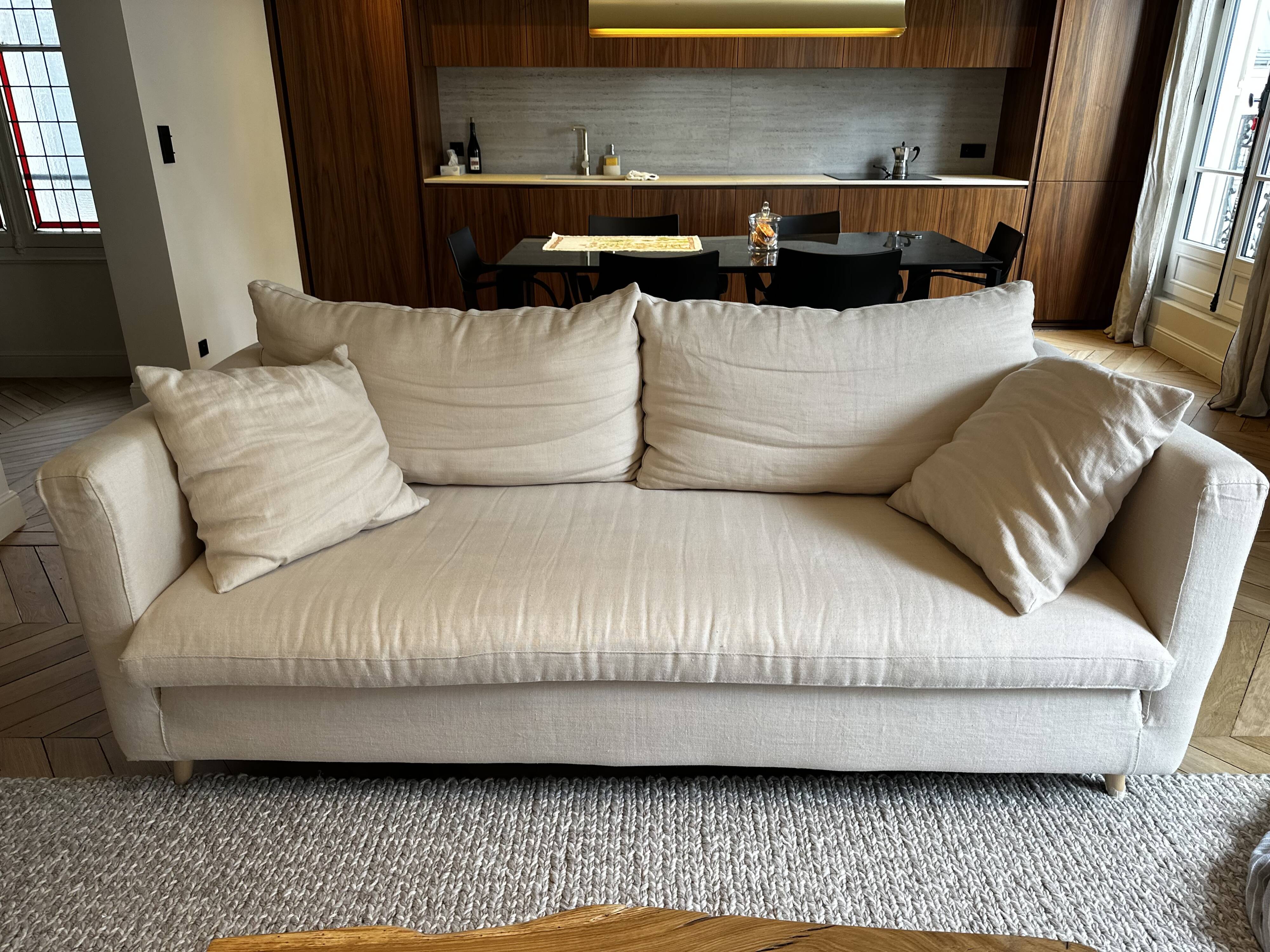 Beige linen sofa and armchair with stain-resistant treatment