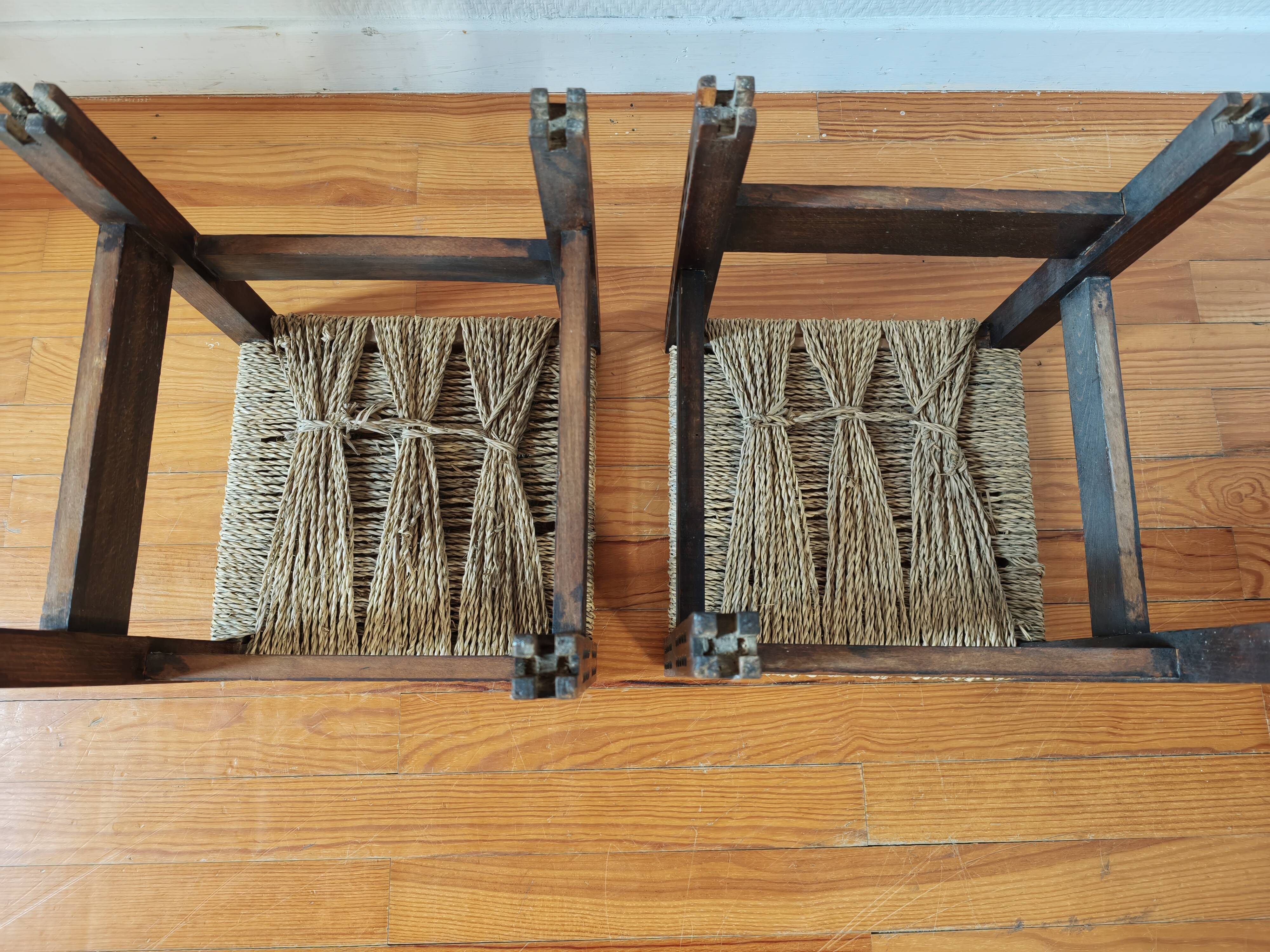 Pair of handcrafted stools from Friuli in carved wood, Italy, circa 1960.