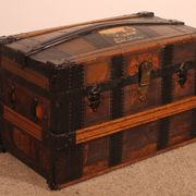 travel trunk from the early 20th century made of leather and wood