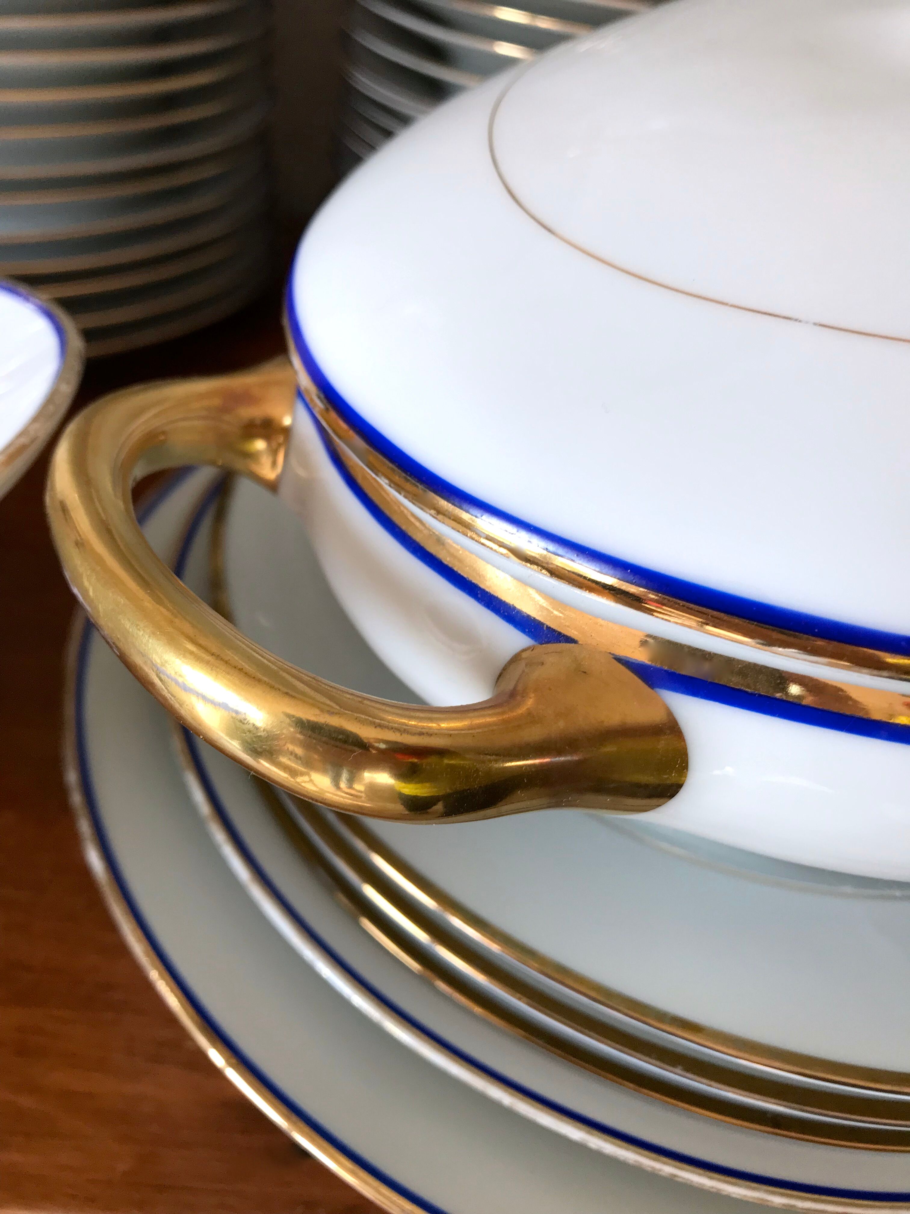 table service art deco limoges porcelain white border blue and gold 61 pieces signed