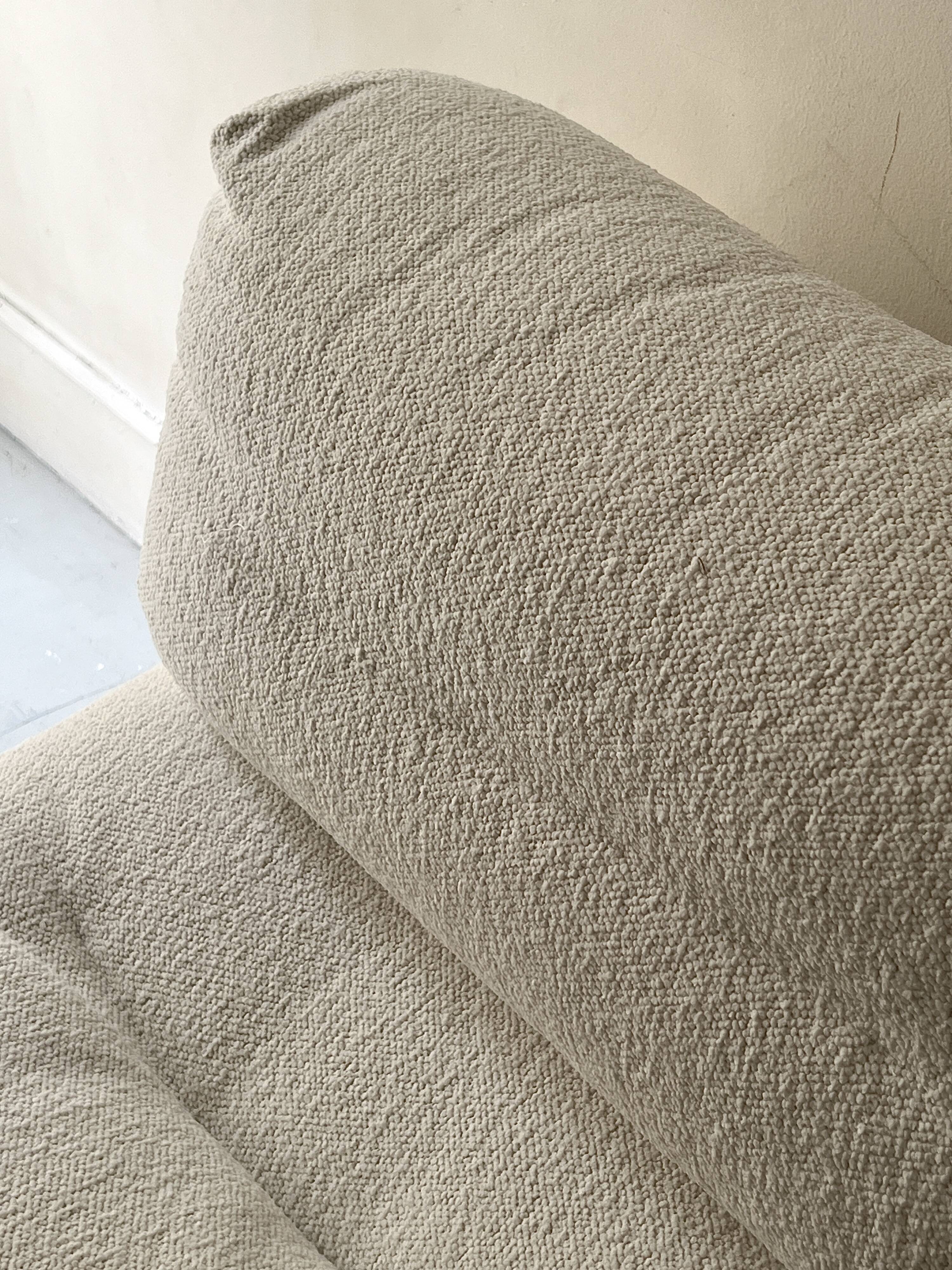 Italian off-white chenille armchair with a wooden base, 1970s design.