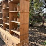 Large antique workshop furniture with drawers and shelves.