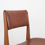 Pair of chairs in wood and brown skaï