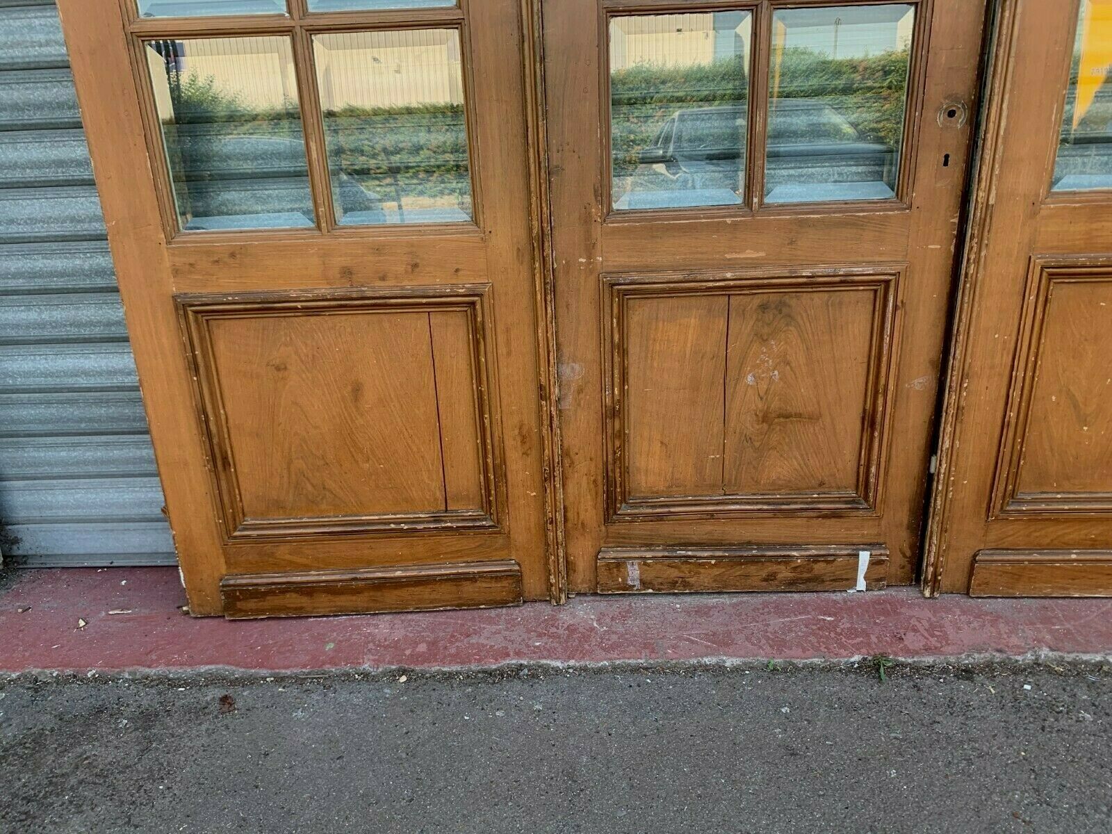 Suite of four separation doors in patinated wood Beveled tiles XX century
