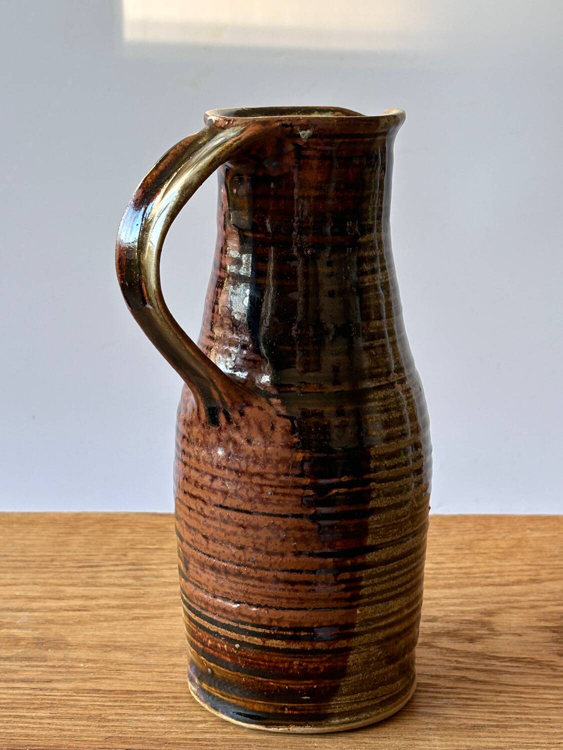 Vintage enameled stoneware pitcher