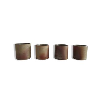 4 mugs in ochre sandstone from the 60 years