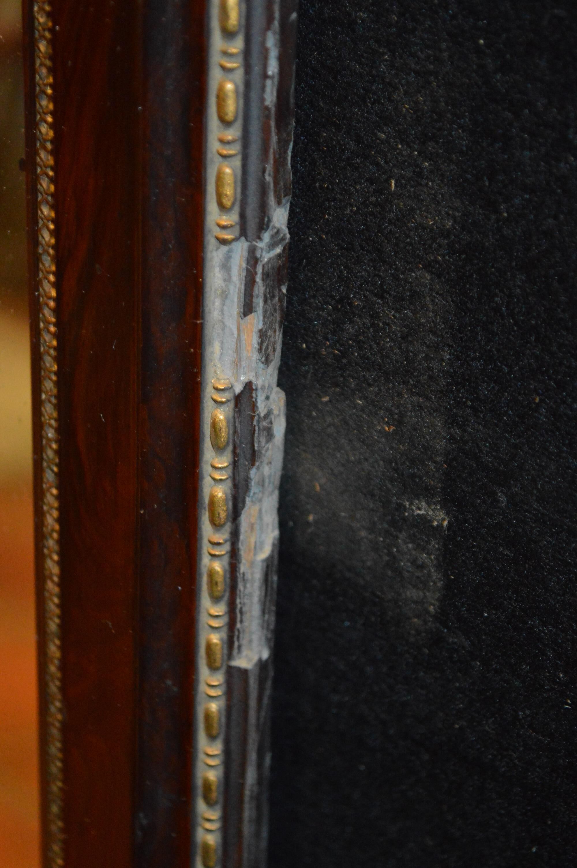 Mirror style restoration enhances brass mahogany