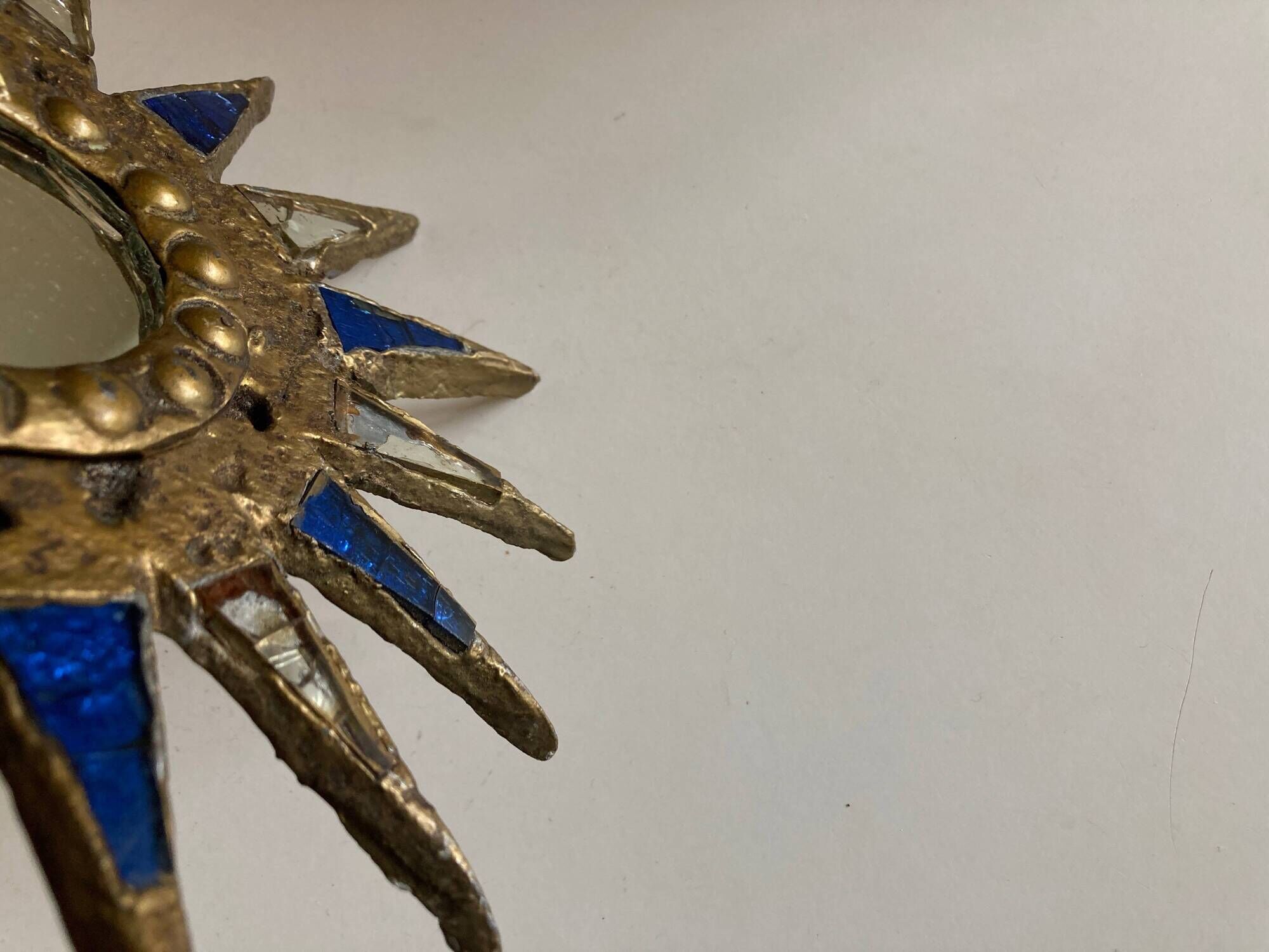 Sun mirror in gilded lead and blue glass Irena Jaworska 1960