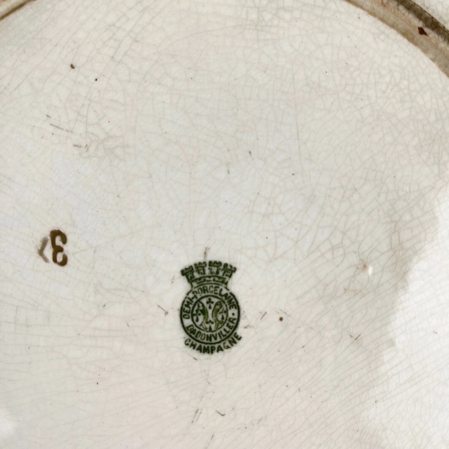 Plat rond "Champagne", Badonviller, vert, début XXème s.