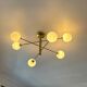 Lustre Cassius with 6 white glass globes and gold metal.