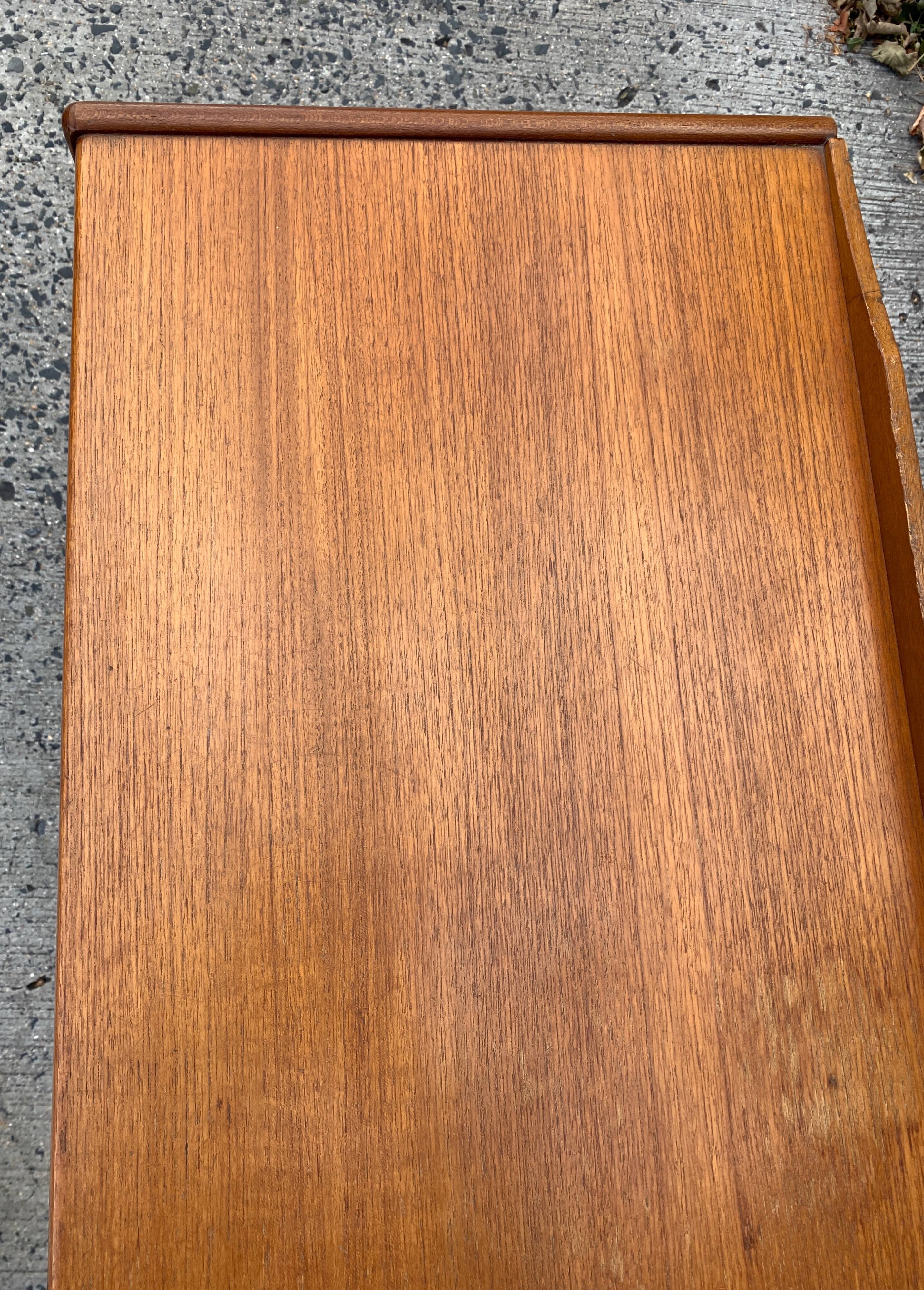 Teak enfilade from the 1970s by the English brand William Laurence.