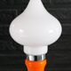 Table lamp or bedside lamp from the 1960s-70s in orange and chrome.