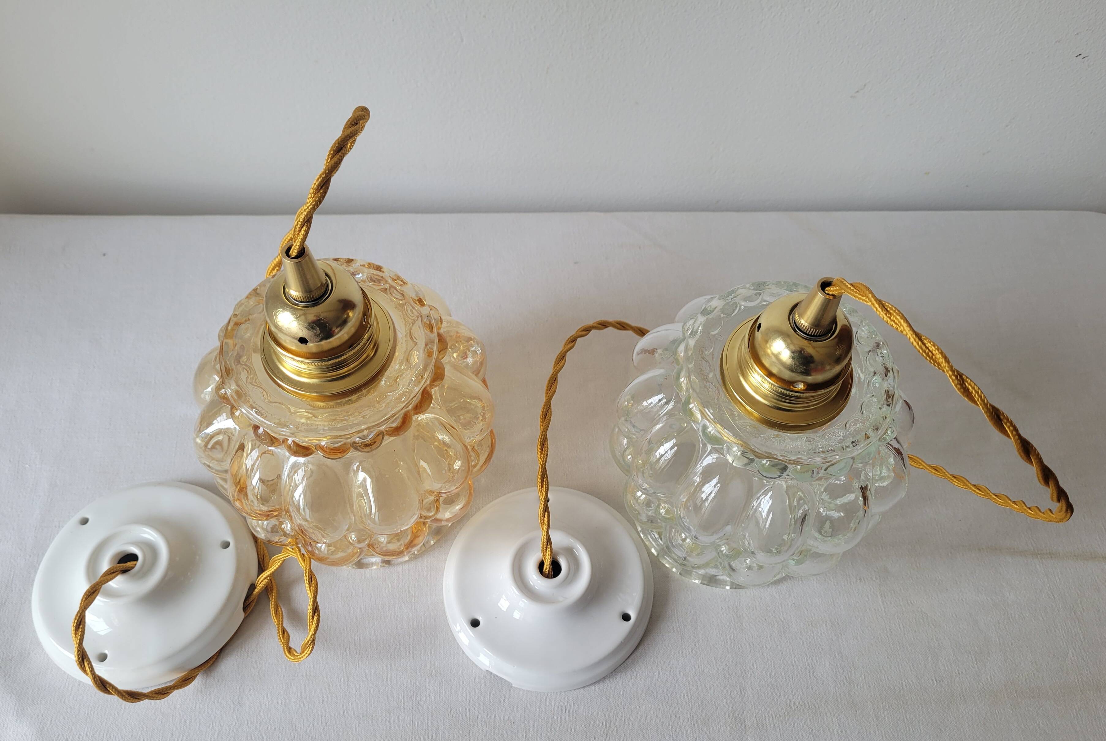 Duo of molded glass pendant lights