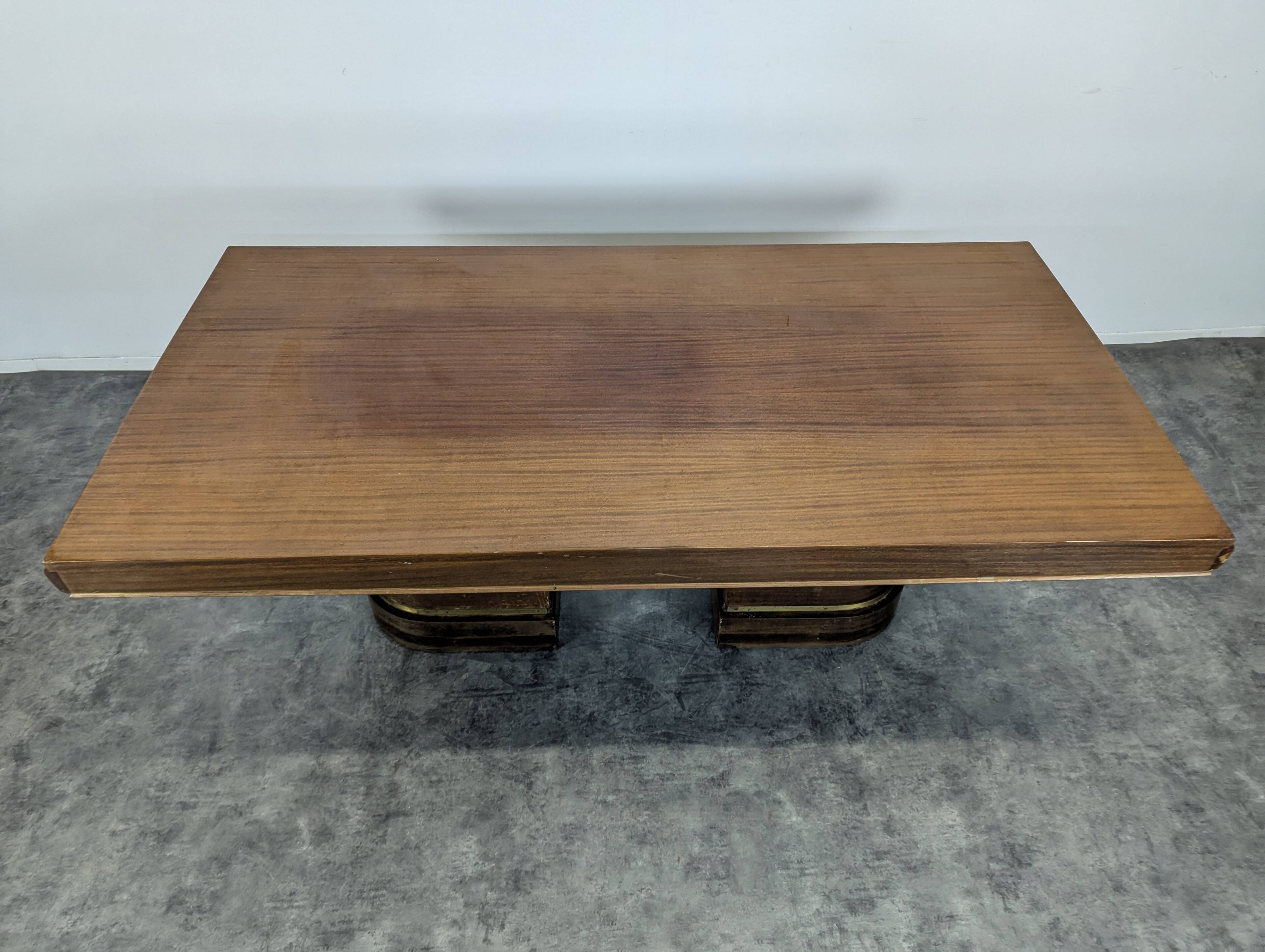 Modernist table in rosewood and brass