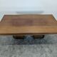 Modernist table in rosewood and brass