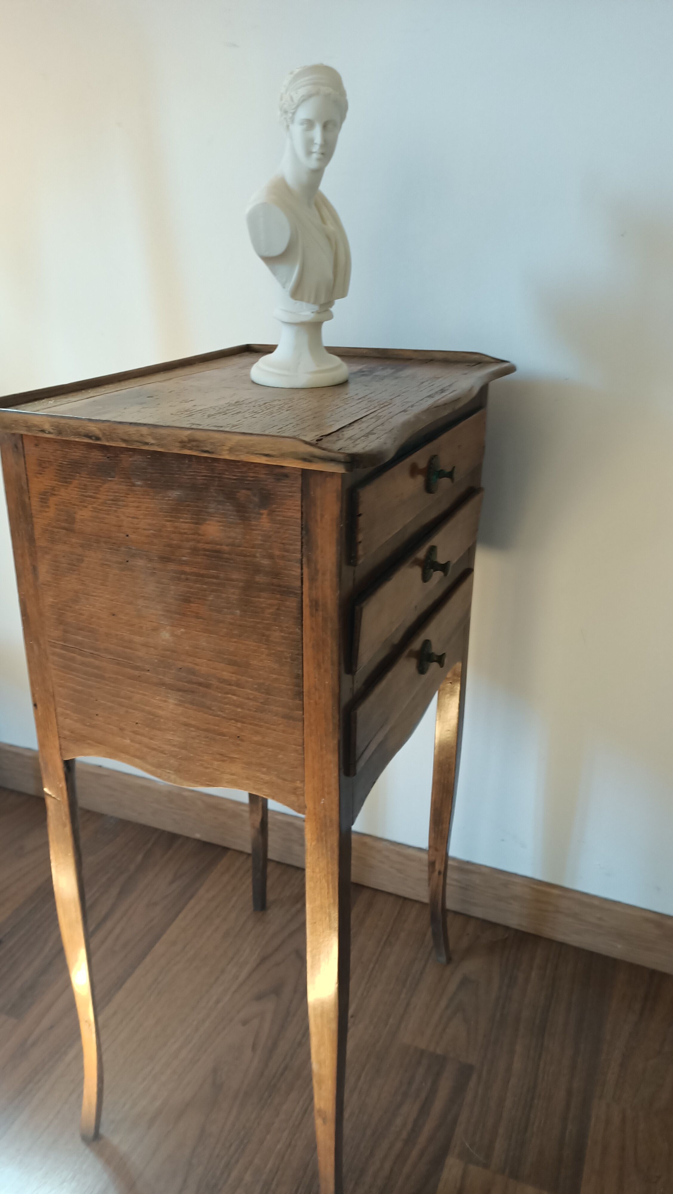 Bedside table with secret drawer