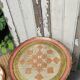 Pink and golden Florentine round top
