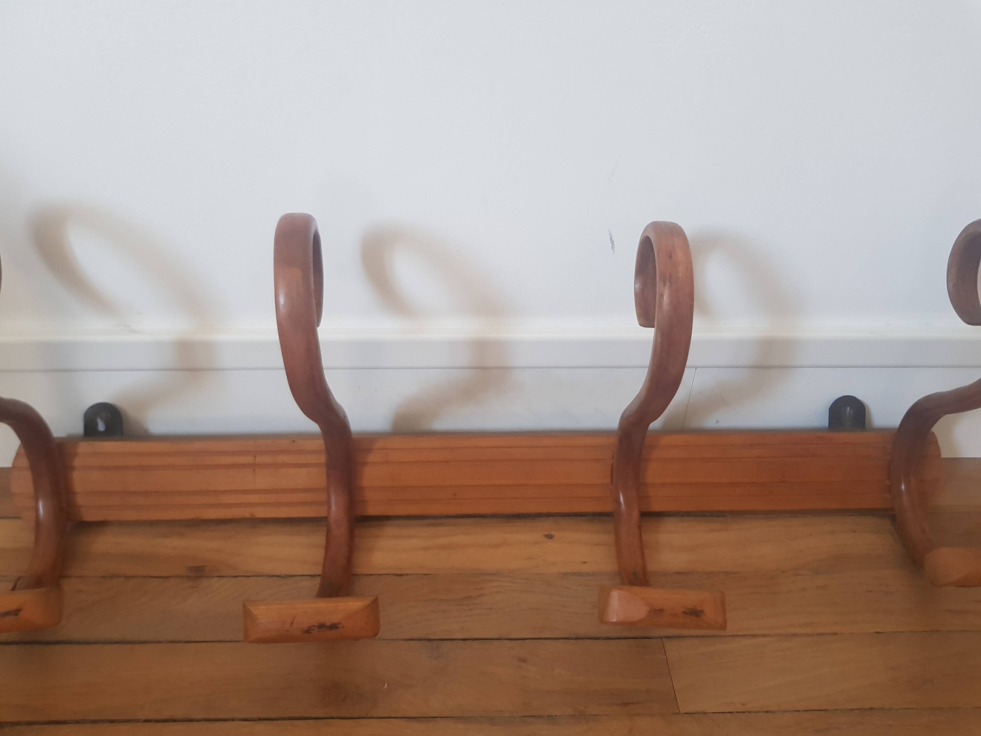 Wooden wall coat rack