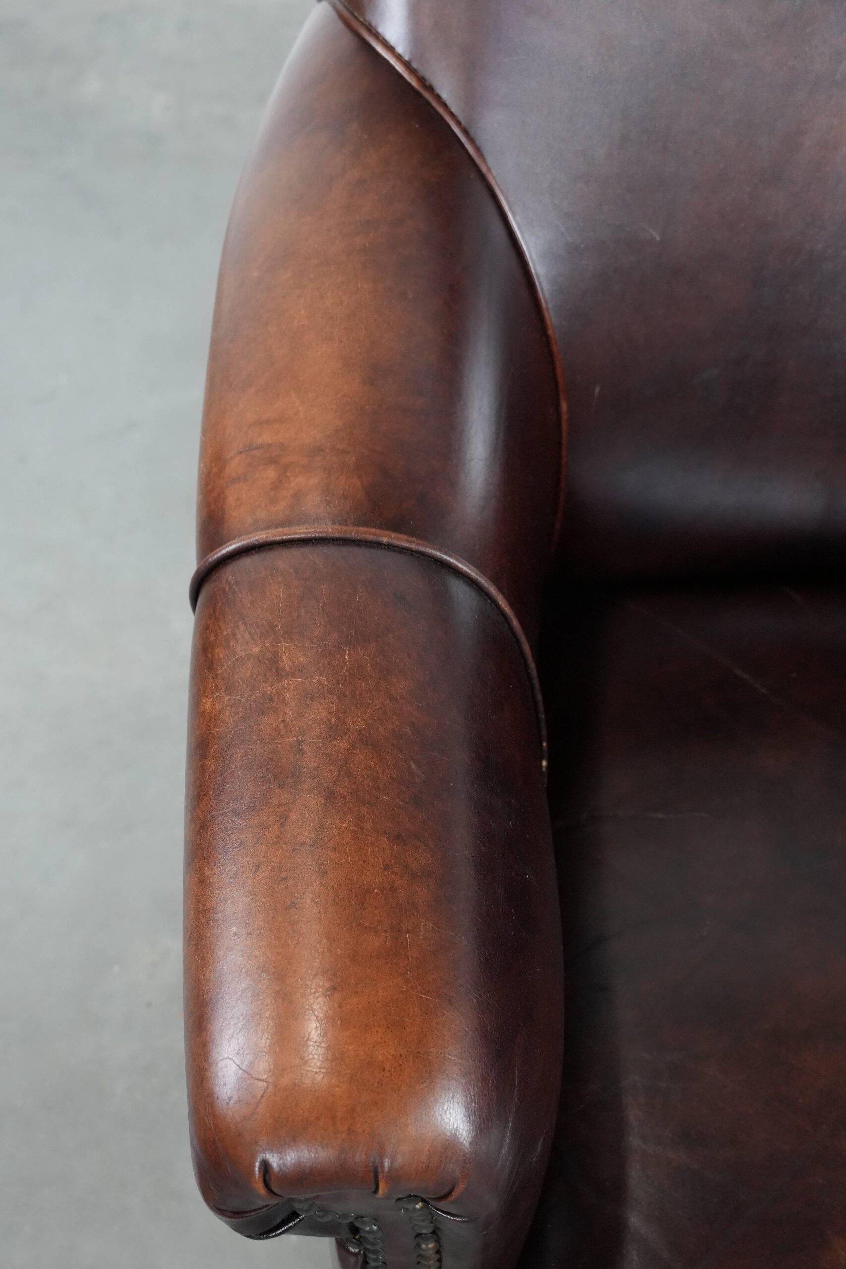 Characterful and comfortable cowhide leather armchair
