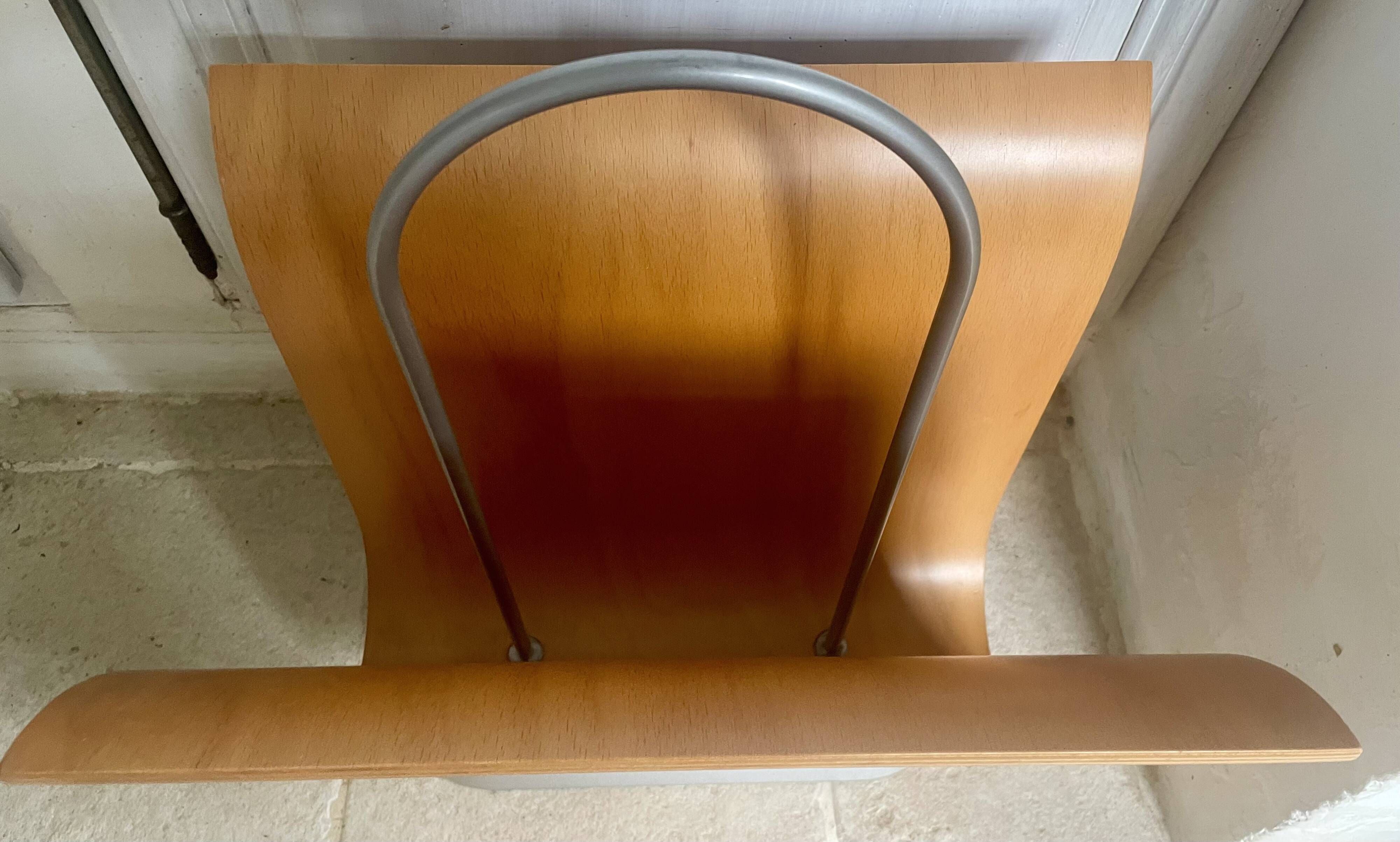 Vintage curved wooden magazine rack by Ligne Roset, 1970s.