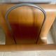 Vintage curved wooden magazine rack by Ligne Roset, 1970s.