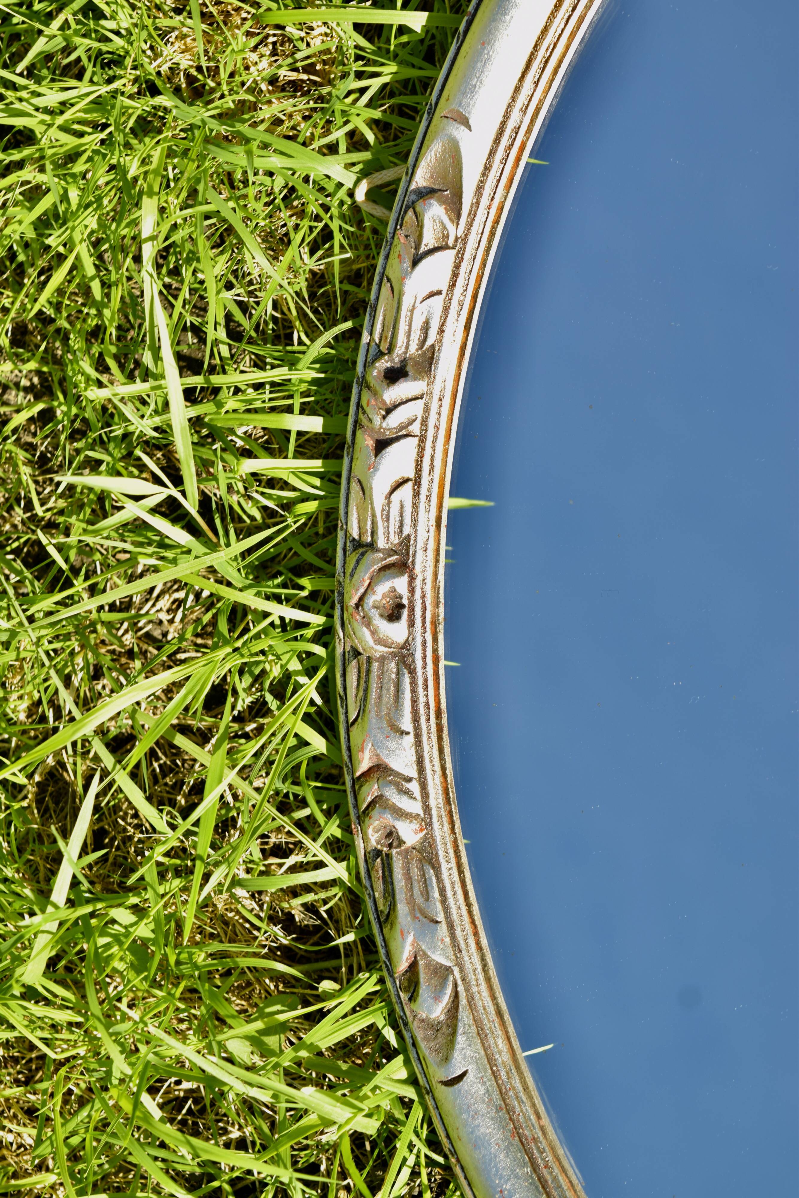 Old large oval wall mirror in silver painted wood - 1950s