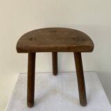 Old wooden tripod stool