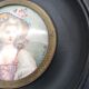Miniature on ivory. Young woman with a flowery hat
