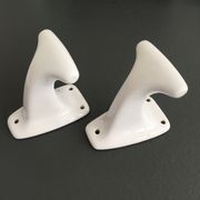 Pair of retro white porcelain hooks