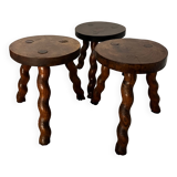 Wooden tripod stool with twisted legs