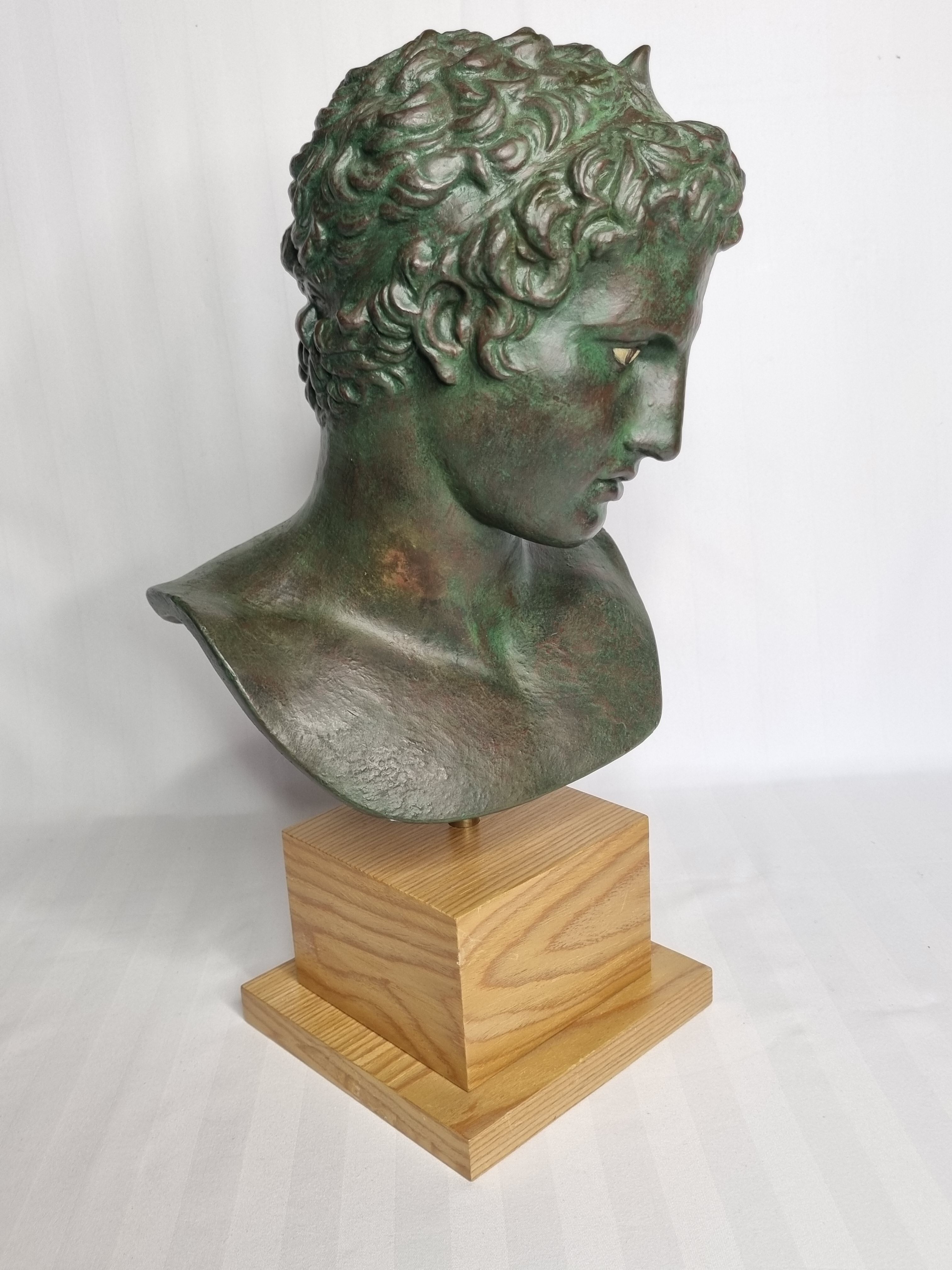 Bust of the Ephebus of Marathon in patinated plaster on base