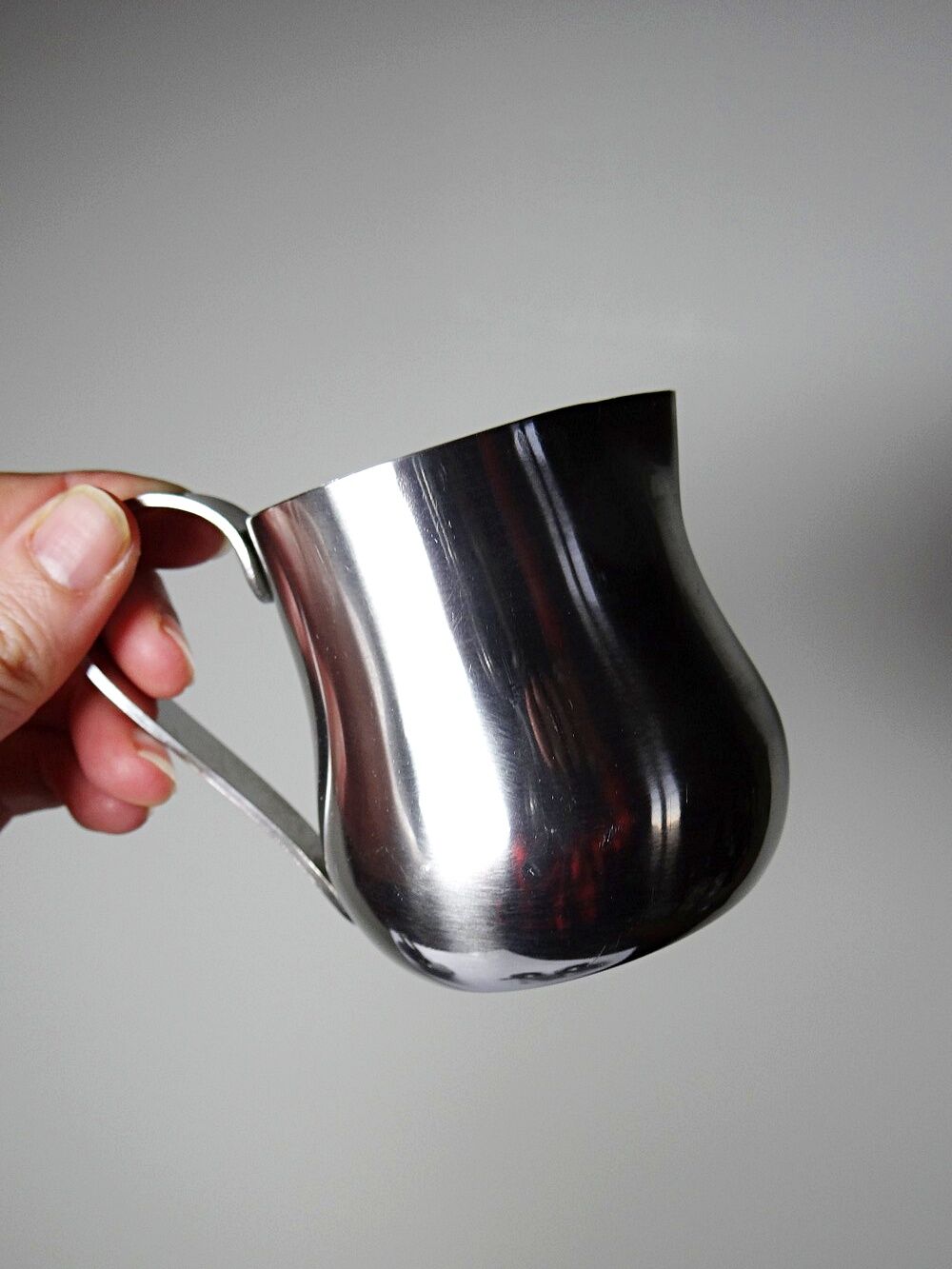 Set of 4 vintage bar measures in brushed stainless steel from the 60s-70s.