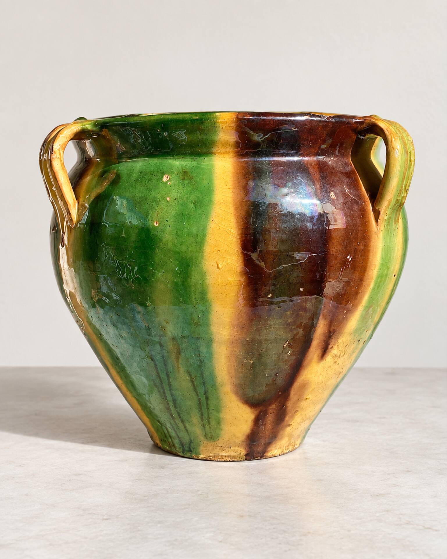 Ancient glazed terracotta pot from the 19th century, south-west France.