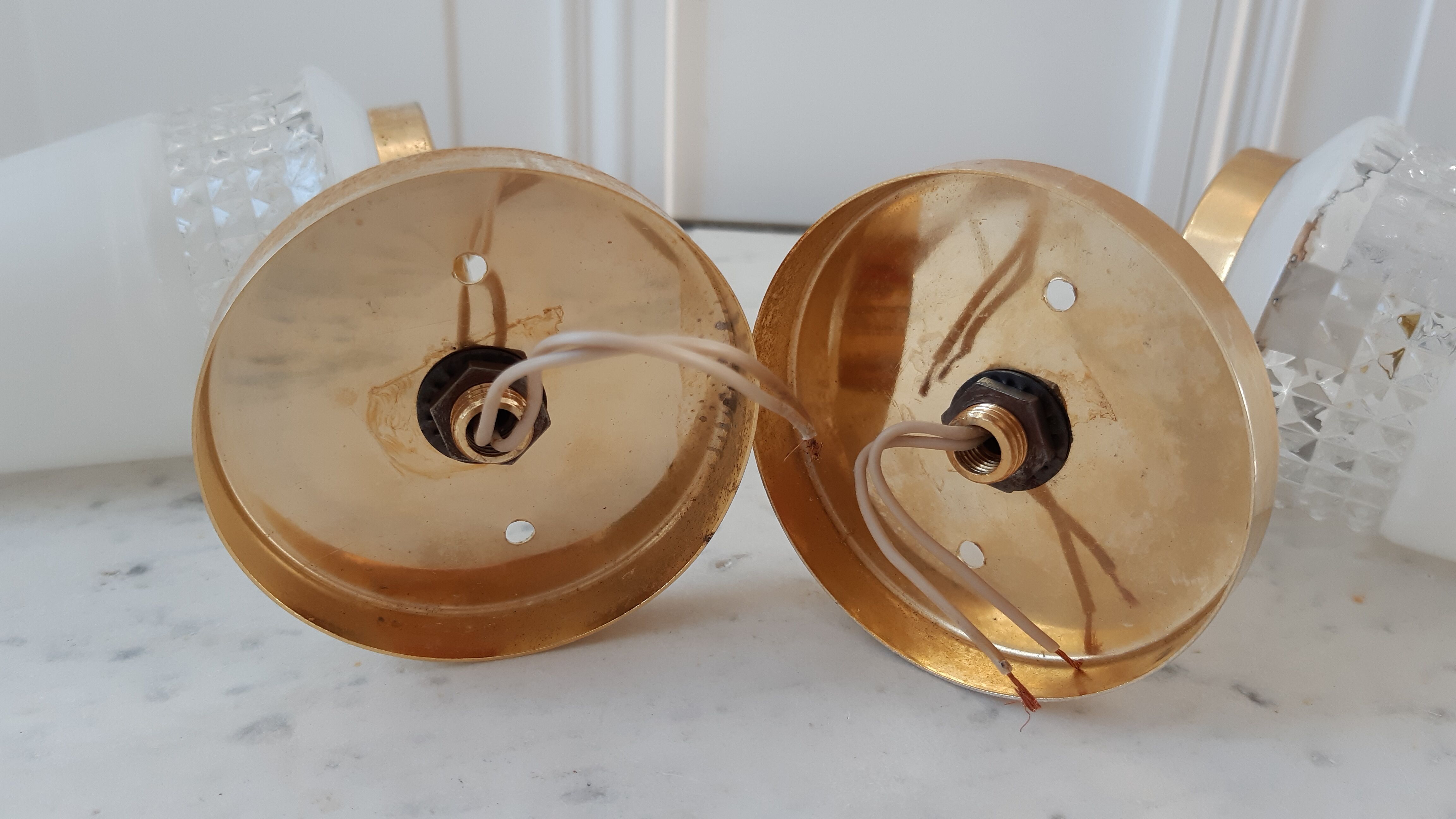 Pair of glass and gilded metal sconces 50s