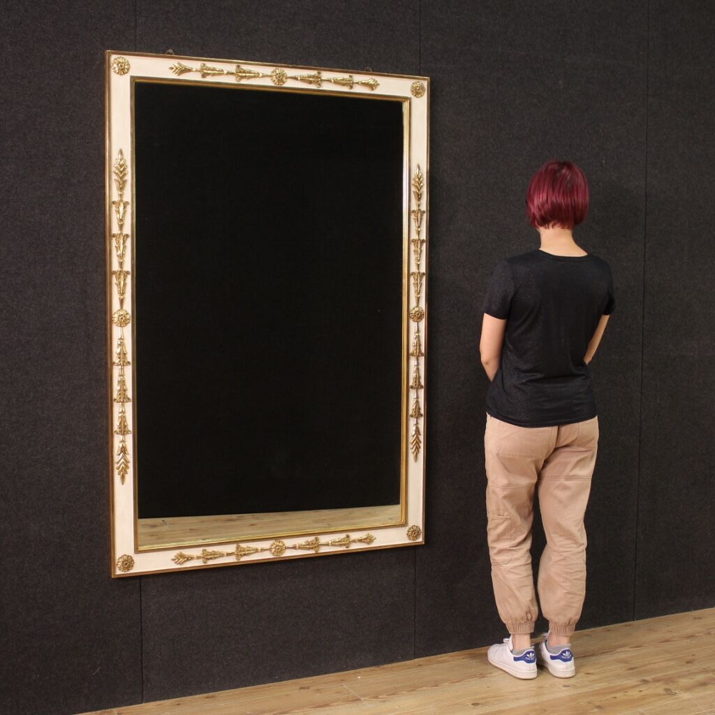 Lacquered and gilded mirror in Louis XVI style