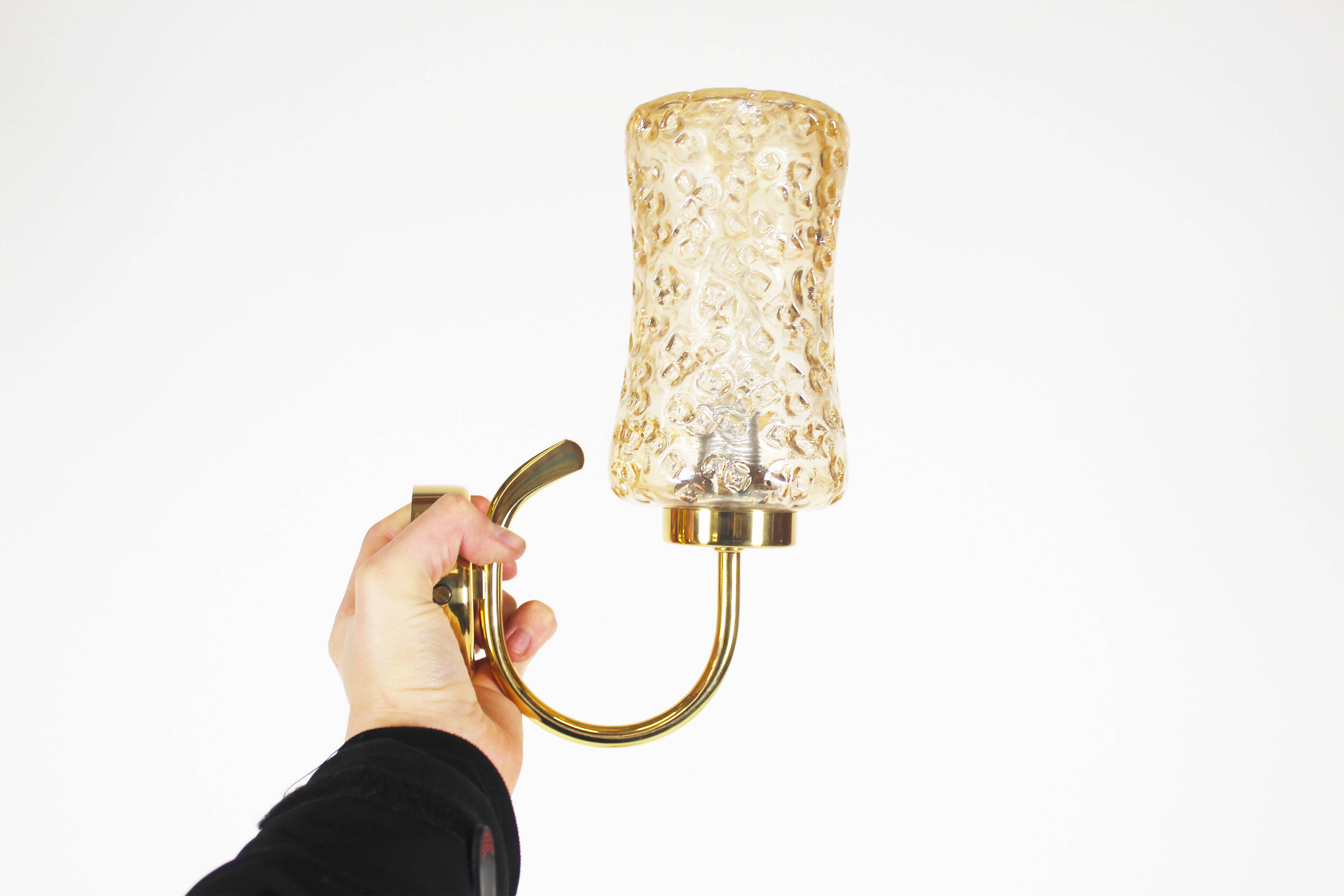 Set of two vintage brass and amber glass wall lamps by Wila Leuchten