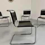 Lot of 4 tubular chairs designed by Mart Stam in vintage black leather from the 1980s.
