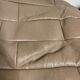 Pair of De Sède patchwork leather poufs