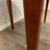 Extendable round table in rosewood 1960