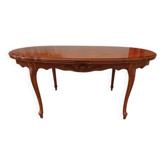 Large Régence style table with integrated extensions.