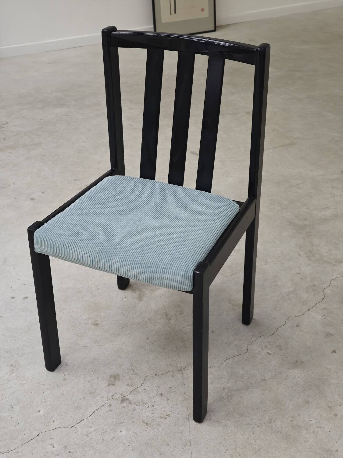 Set of 4 modernist black chairs with light blue ribbed fabric