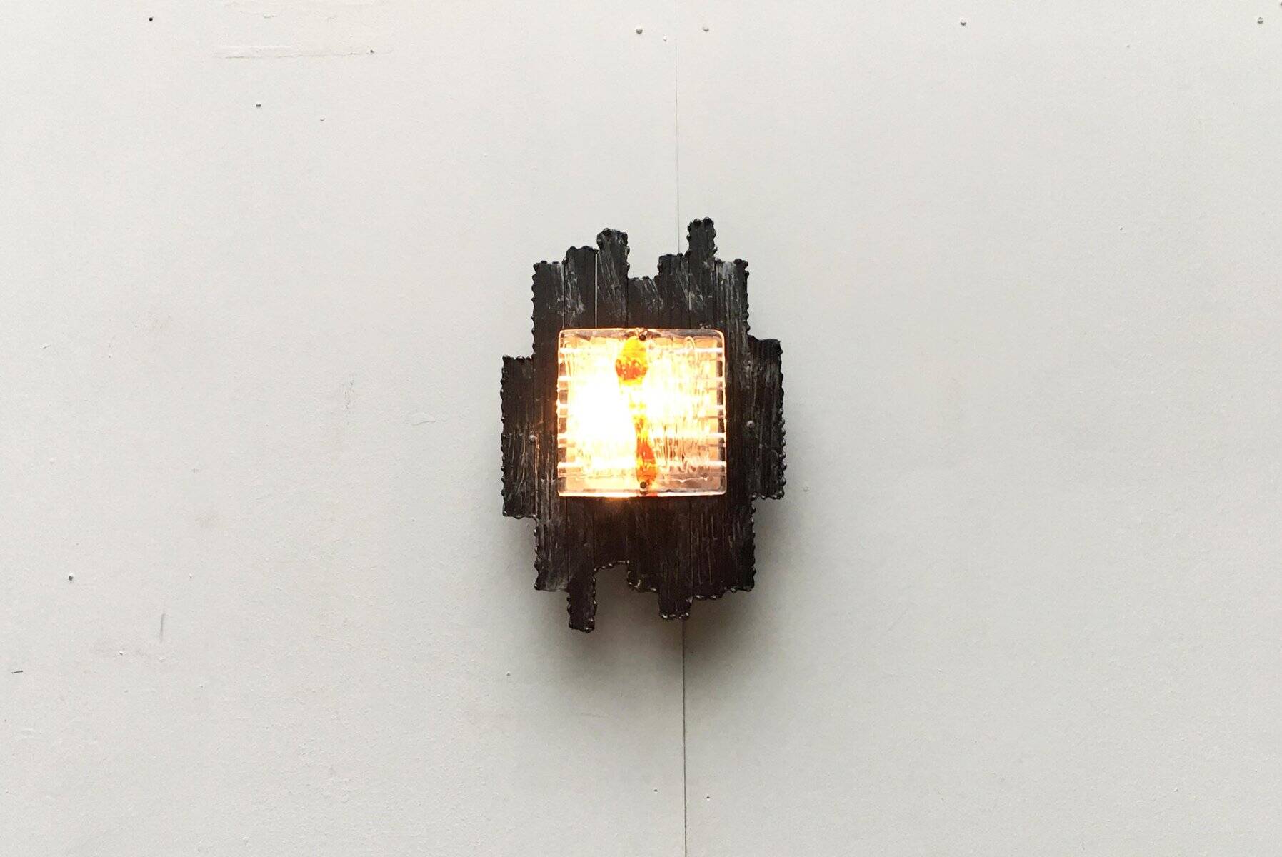 Vintage Italian brutalist wall light in wrought iron by Albano Poli for Poliarte, set of 2.