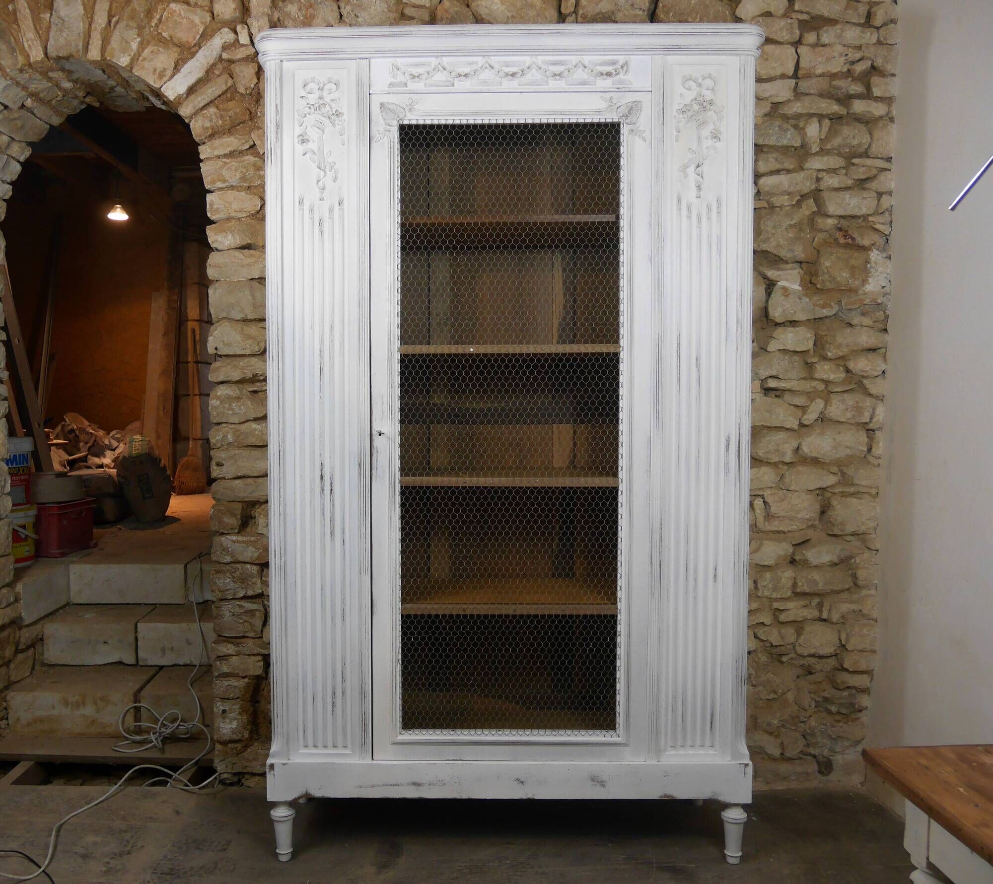 shabby wardrobe with Louis XVI style mesh door