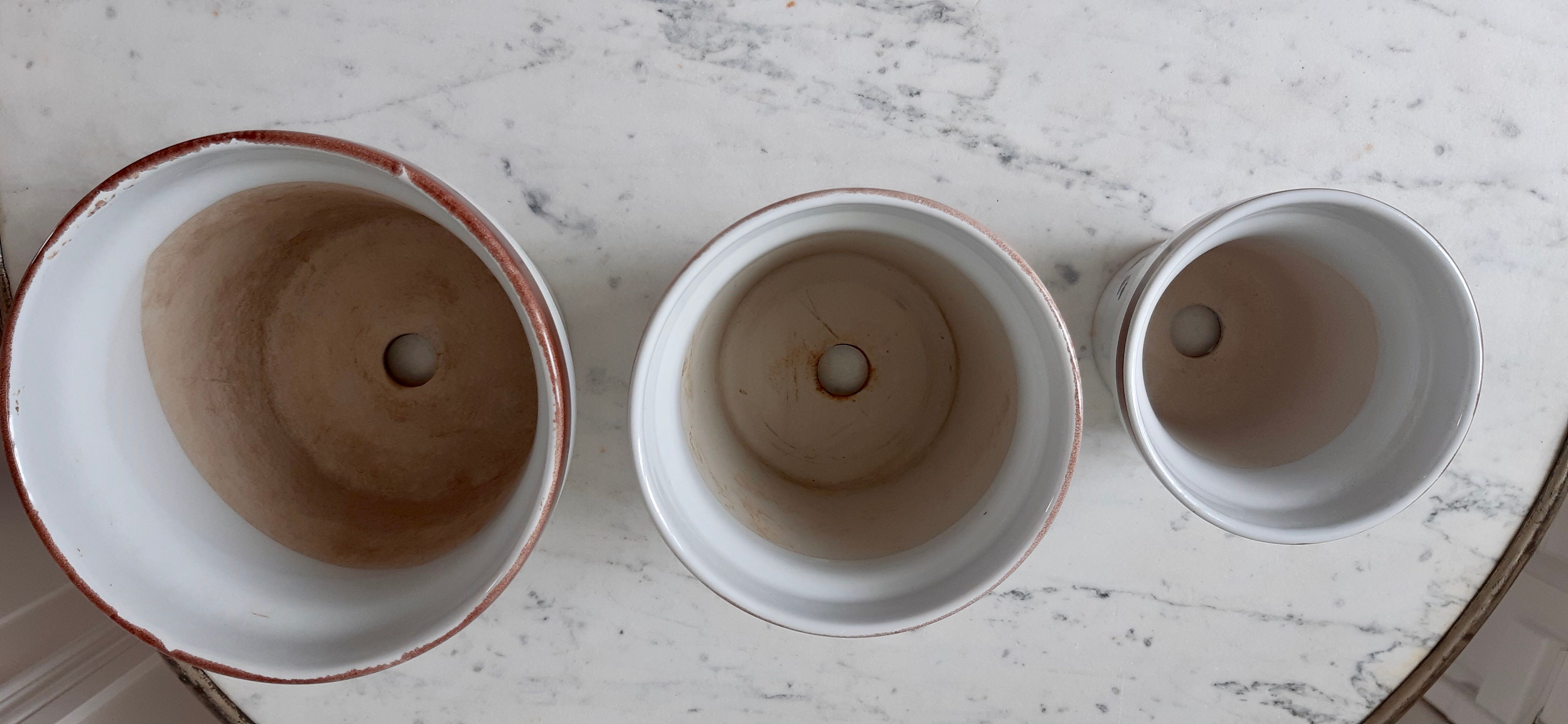 Trio of vintage flowered pot covers 60s