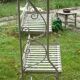 White wrought iron folding shelf