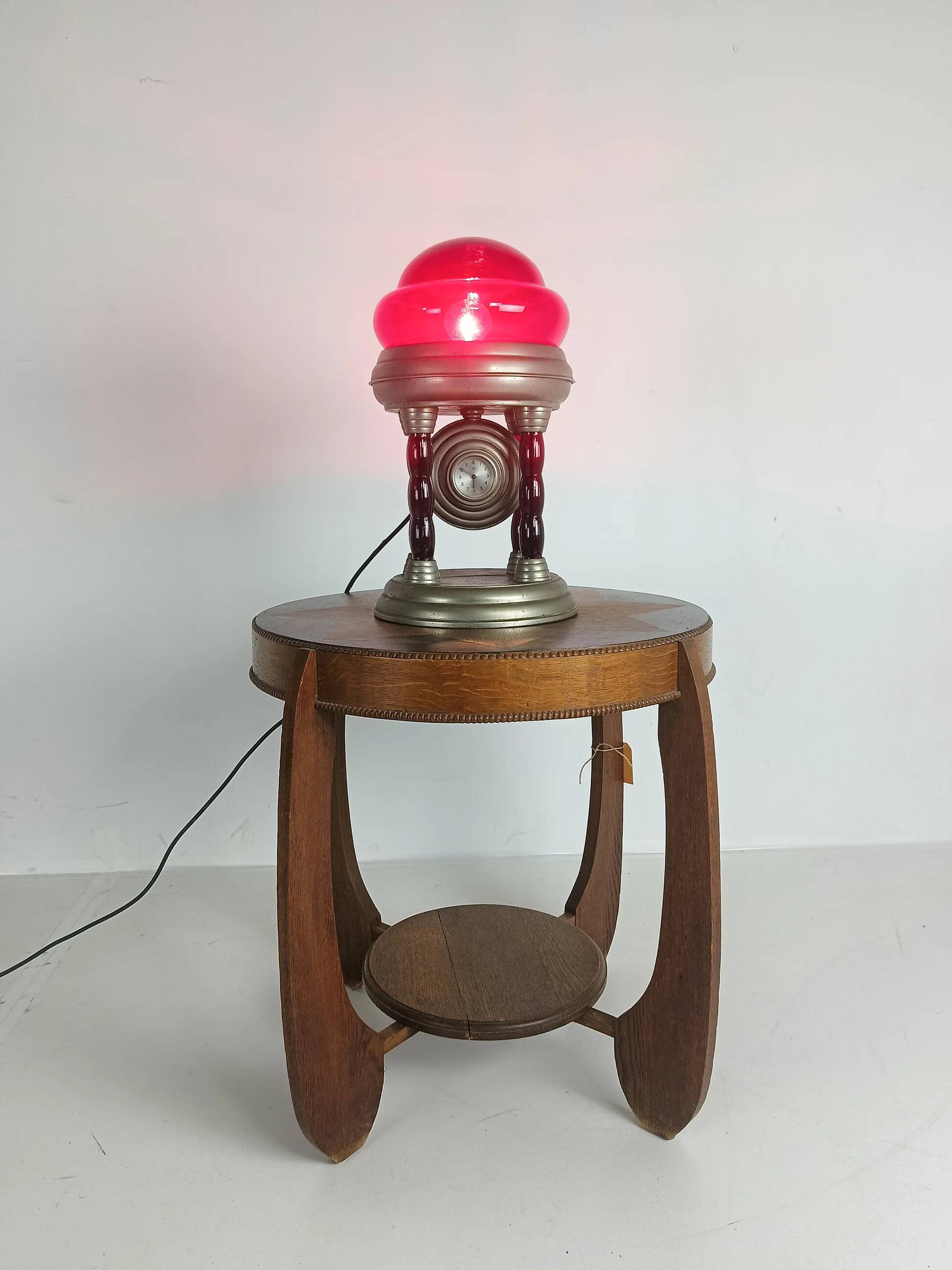 Unique vintage tin lamp with clockwork