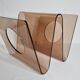 Magazine rack by Michel Dumas for Roche Bobois, smoked plexiglass, 1970s.