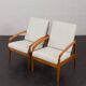 Pair of Kai Kristiansen Paperknife lounge chairs in teak and natural wool